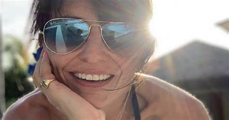 Davina McCall flashes pert derrière in skimpy bikini bottoms Daily Star