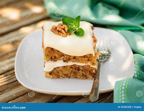 A Piece of Moist Zucchini and Walnut Cake with Cream Cheese Frosting ...