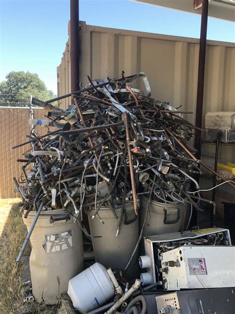 Scrap copper and brass pile at the shop. : r/Plumbing