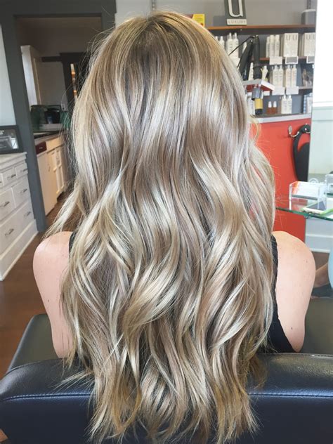 Balayage/Hair painted her to create a beautiful cool blonde and styled