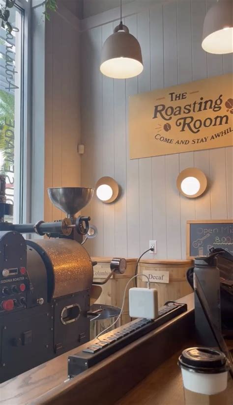 A Coffee Machine Sitting On Top Of A Wooden Counter