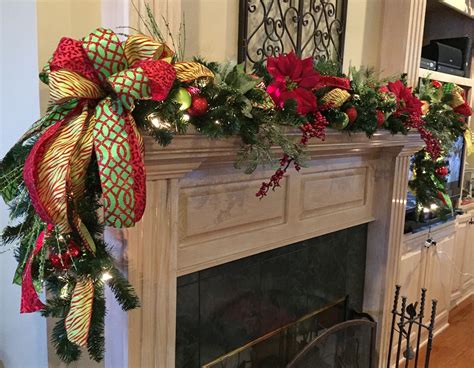 Lighted Christmas Garland With Poinsettias Berries Ornaments And