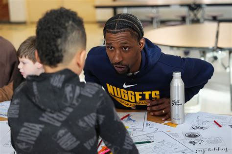 Loyal fans cheer at nuggets stadium for the home team 36