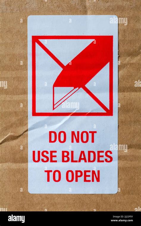 Do Not Use Blades To Open Sticker Hi Res Stock Photography And Images