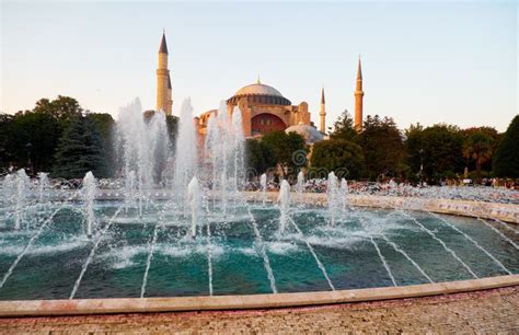 The Fontain In Sultan Ahmet Park With Hagia Sophia On The Background