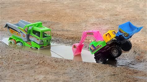 Dump Construction Truck Stuck In Heavy Mud Pulling Out Jcb Pulling