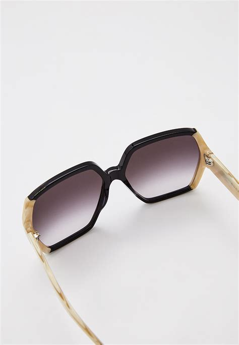 Женские солнцезащитные очки Gucci (Гуччи) GG1065S купить за 33750 руб.