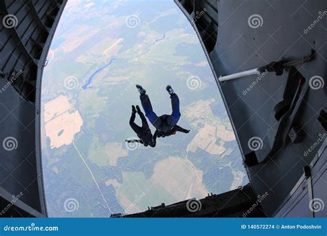 Skydiving Skydivers Are Jumping Out Of A Plane The View From An