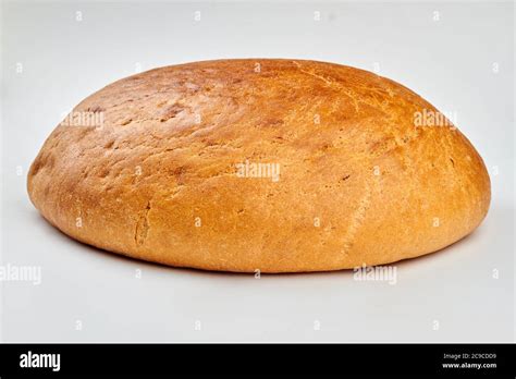 Round loaf of bread on white background Stock Photo - Alamy