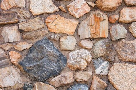 Premium Photo A Wall Of Rocks With The Word Rock On It