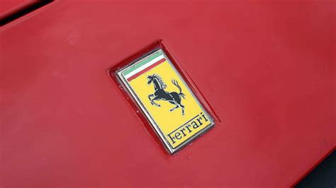 The History Of The Ferrari Logo And The Prancing Horse Logo Design