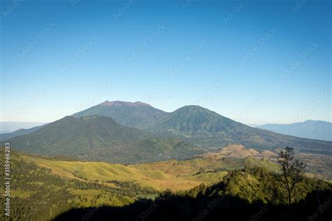 Stunning view on Ijen Crater. Ijen Crater is a volcanic tourism ...