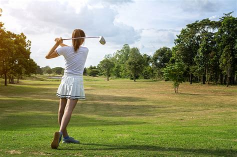 유토이미지 Beautiful Girl Playing Golf On Beautiful Sunny Green Golf