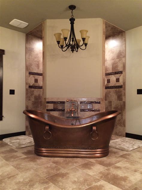 Rustic Bathroom Hammered Copper Tub In Front Of A Corner Walk Through