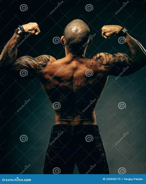 Studio Portrait Of A Muscular African American Or Latino With A Naked Torso Male Strength And