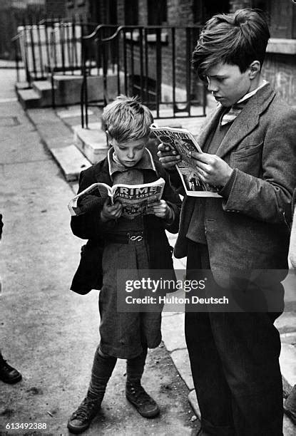 Children Reading Comics Photos And Premium High Res Pictures Getty Images