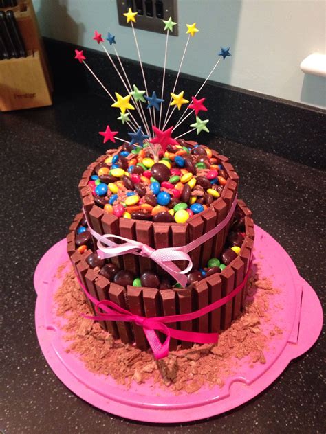 Double Tier Kit Kat Cake With Multi Star Topper And Covered In