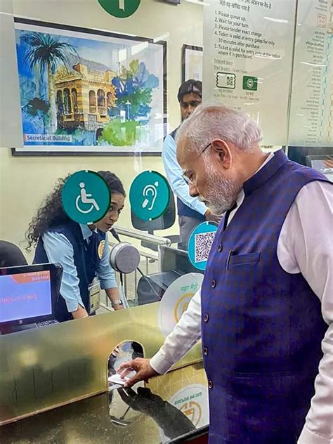 Pm Modi Buys Nagpur Metro Ticket Holds Baby Times Of India