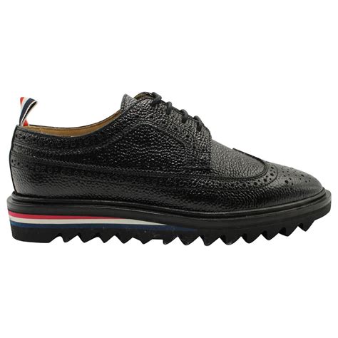 Thom Browne Classic Longwing Threaded Sole Brogues In Black Pebble