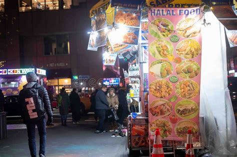 Nighttime NYC Street Scene with Colorful Halal Food Truck Pedestrians ...