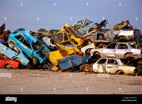 Junk Cars On Junkyard Stock Photo - Alamy