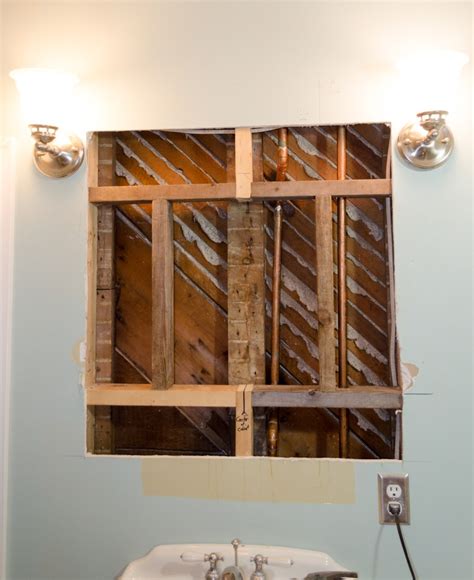 how to install a medicine cabinet in the wall