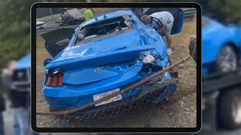 Watch 2024 Ford Mustang GT Crash Into And Over Fence At Drag Strip