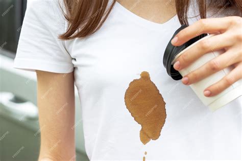 Premium Photo Coffee Stain Unrecognizable Girl Spilling Hot Coffee