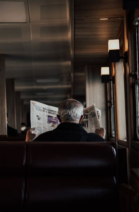 A Person Reading Newspaper · Free Stock Photo