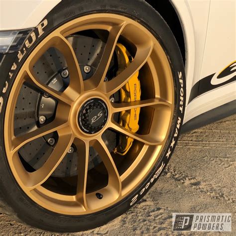 Porsche 911 GT3 RS Wheels finished with Satin Poly Gold | Prismatic Powders