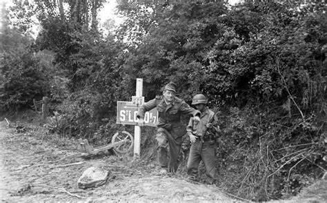 The Same Mp From The Us 29th Infantry Division With A German Pow On