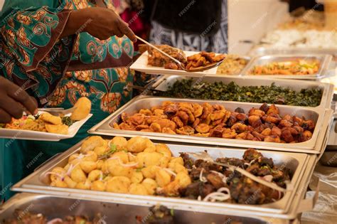 Premium Photo Closeup Of African Food During A Buffet At A Party