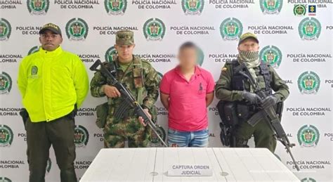 Sospechoso De Asesinar A Policía En Plan Pistola Del Clan Del Golfo En