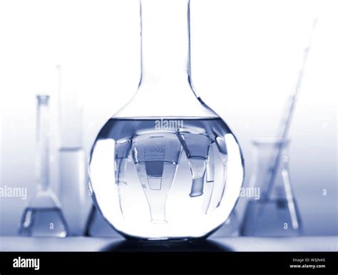 Test Tubes With Reflections On A White And Blue Background Laboratory