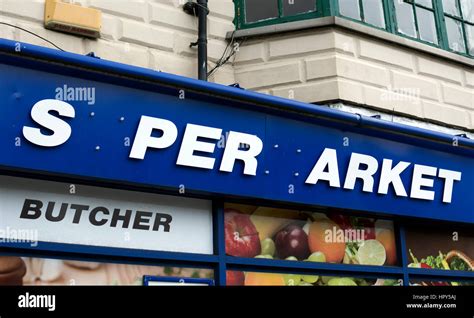 Supermarket sign with missing letters, Rugby, Warwickshire, England, UK ...