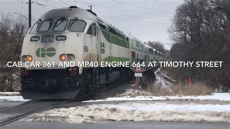 Cab Car 361 And Mp40 Go Train Engine 664 Pushes A Six Car Train At