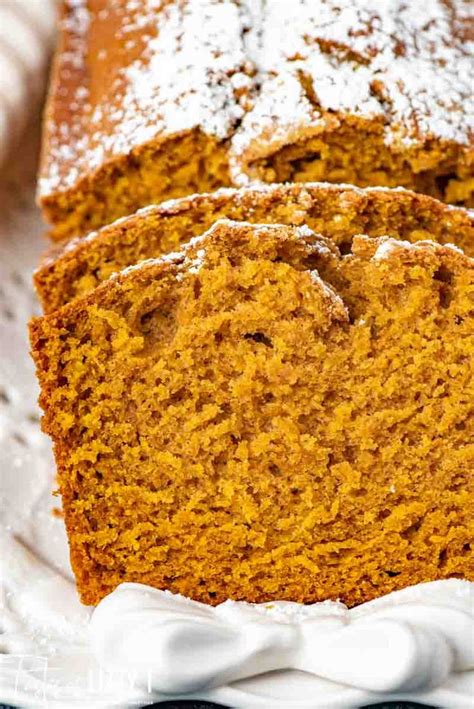 Sliced Loaf Of Pumpkin Bread On A White Plate