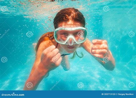 Cute Girl In Scuba Mask Swim And Pose Underwater Royalty-Free Stock ...