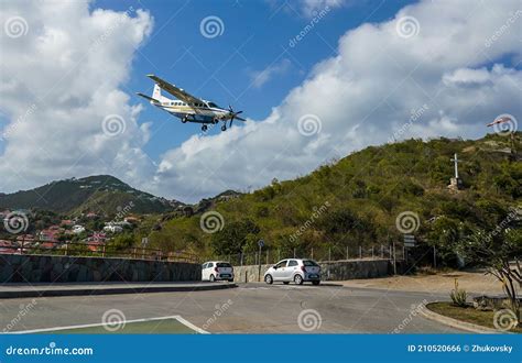 St. Barth Commuter Plane Landing At Remy De Haenen Airport Also Known As Saint Barthelemy ...