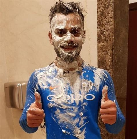 Photos Virat Kohli Gets Face Full Of Cake Rediff Cricket