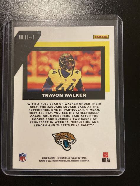 2022 Panini Chronicles Flux Travon Walker FX 11 RC Jacksonville