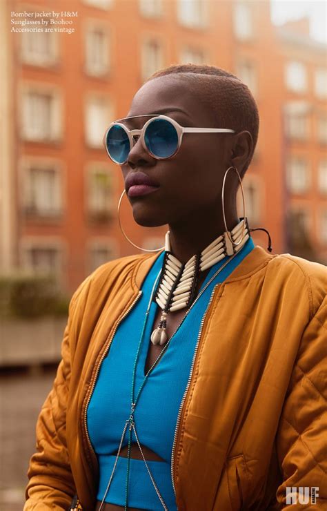 A Woman With Headphones And Sunglasses On