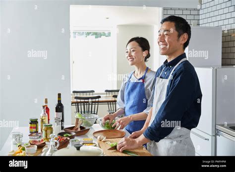 Japanese Mature Couple In The Kitchen Stock Photo Alamy