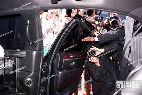 Paparazzi And Fans Taking Photos Inside Car Door Stock Photo Picture