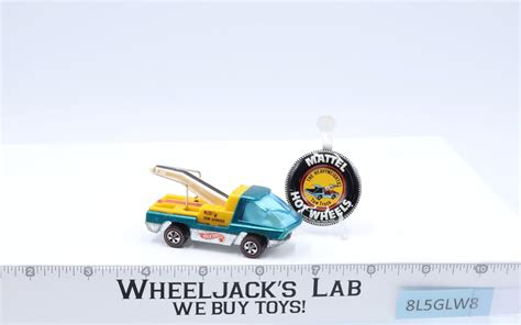 The Heavyweights Tow Truck Aqua Teal Hot Wheels 1969 Mattel Redline RL W Button Wheeljack S Lab