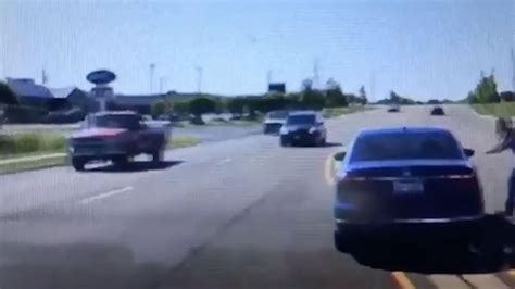 Man Jumps Into Moving Car To Save Driver After Having A Seizure Behind