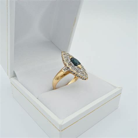 Bague Marquise Or Jaune Carats Sertie Piere Bleu Et D Clats De