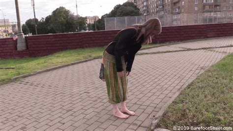 Mature Hippie Girl Olga Walks Barefoot In A Dirty City On A Rainy Day Full Barefoot Street