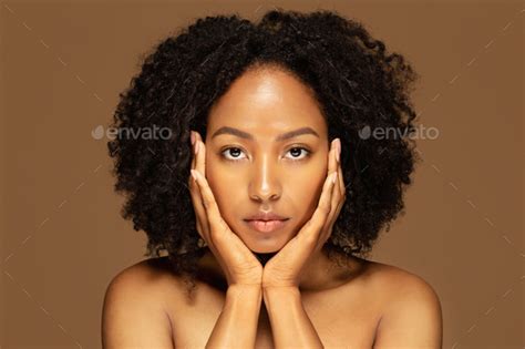 Closeup Of Beautiful Half Naked Black Woman Touching Her Face Stock Photo By Prostock Studio
