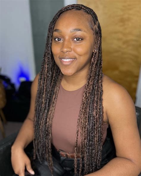 Styles with faux locs are perfect for a protective summer look 23